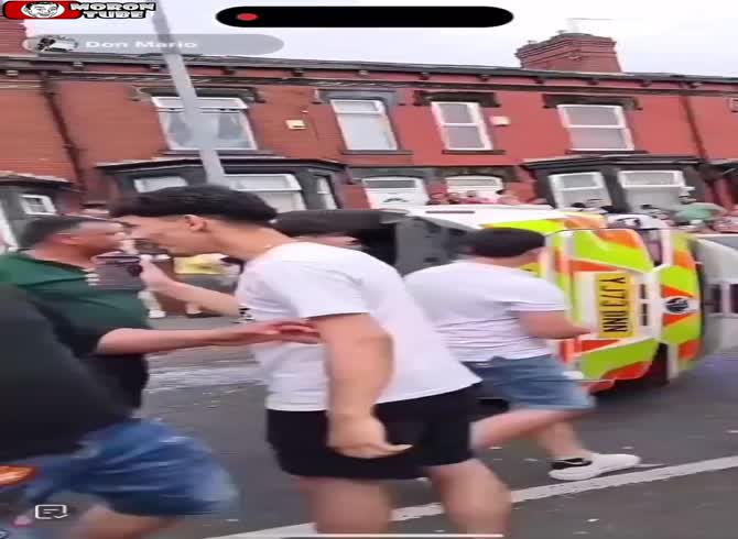 Video :Leeds nighttime brawl - rioters smash a police vehicle and burn a bus